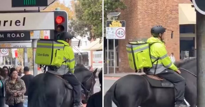 Un livrator de mâncare Uber a făcut furori circulând pe un cal